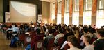 Teilnehmer des IfB Forums sitzen in der Aula Scheffelberg und hören den Vortrag von Prof. Zirkler