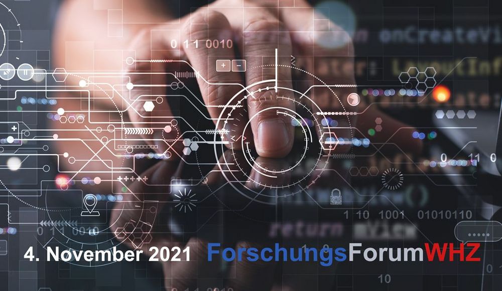 Foto: Eine Hand zeigt auf eine Grafik.
